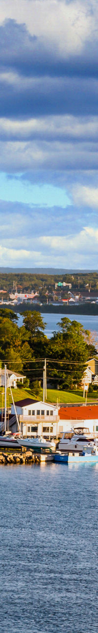 Scenic waterfront village with marina views
