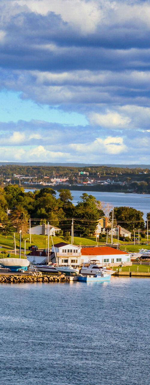 Scenic waterfront village with marina views