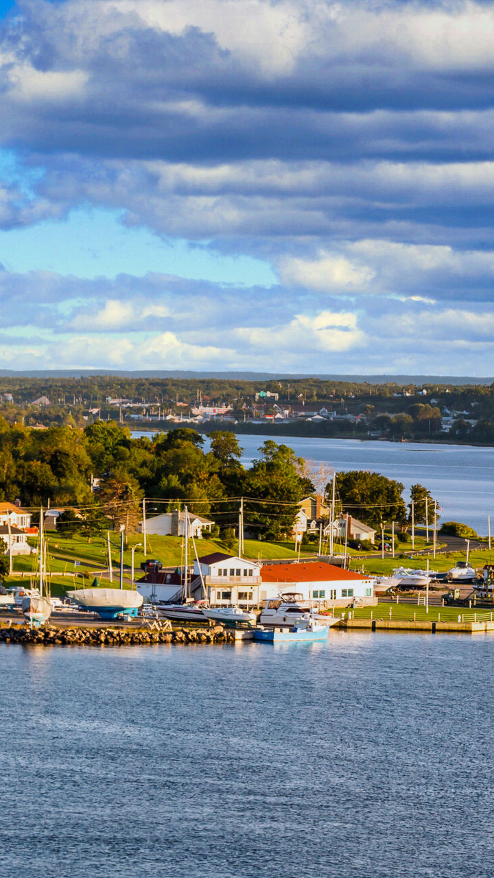 Scenic waterfront village with marina views