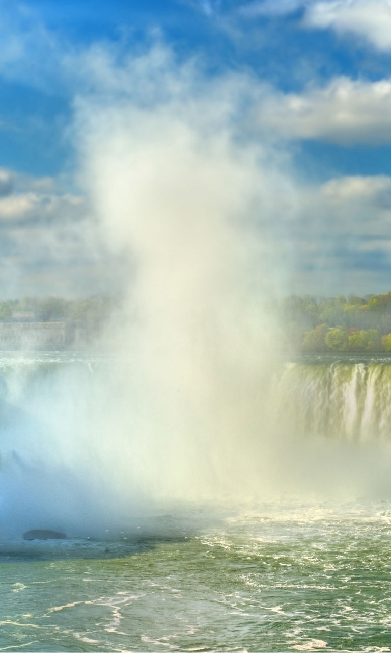 Majestic Niagara Falls under blue sky