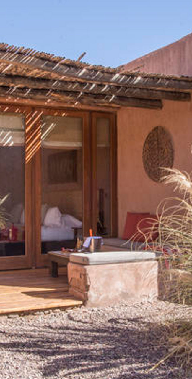 Rustic adobe house with outdoor patio