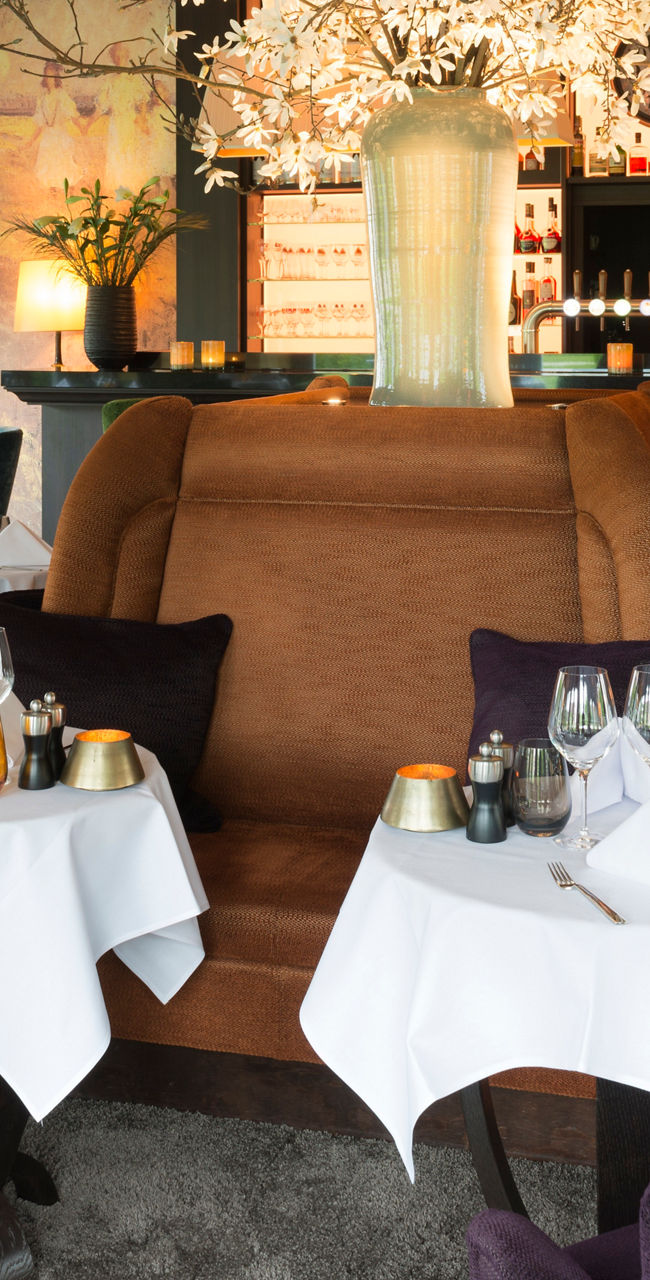 Elegant restaurant interior with floral centerpiece