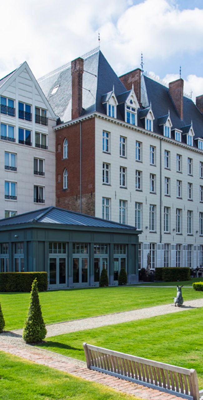 Elegant hotel with landscaped garden view