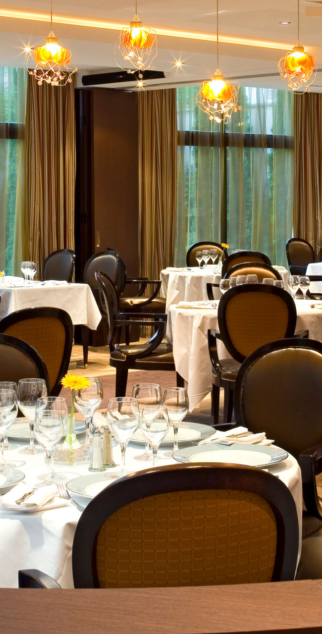 Elegant restaurant interior with red accents
