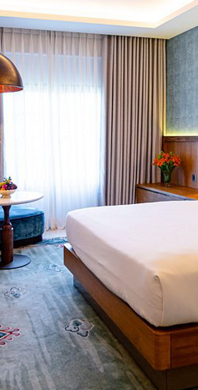 Modern hotel room with cozy seating area