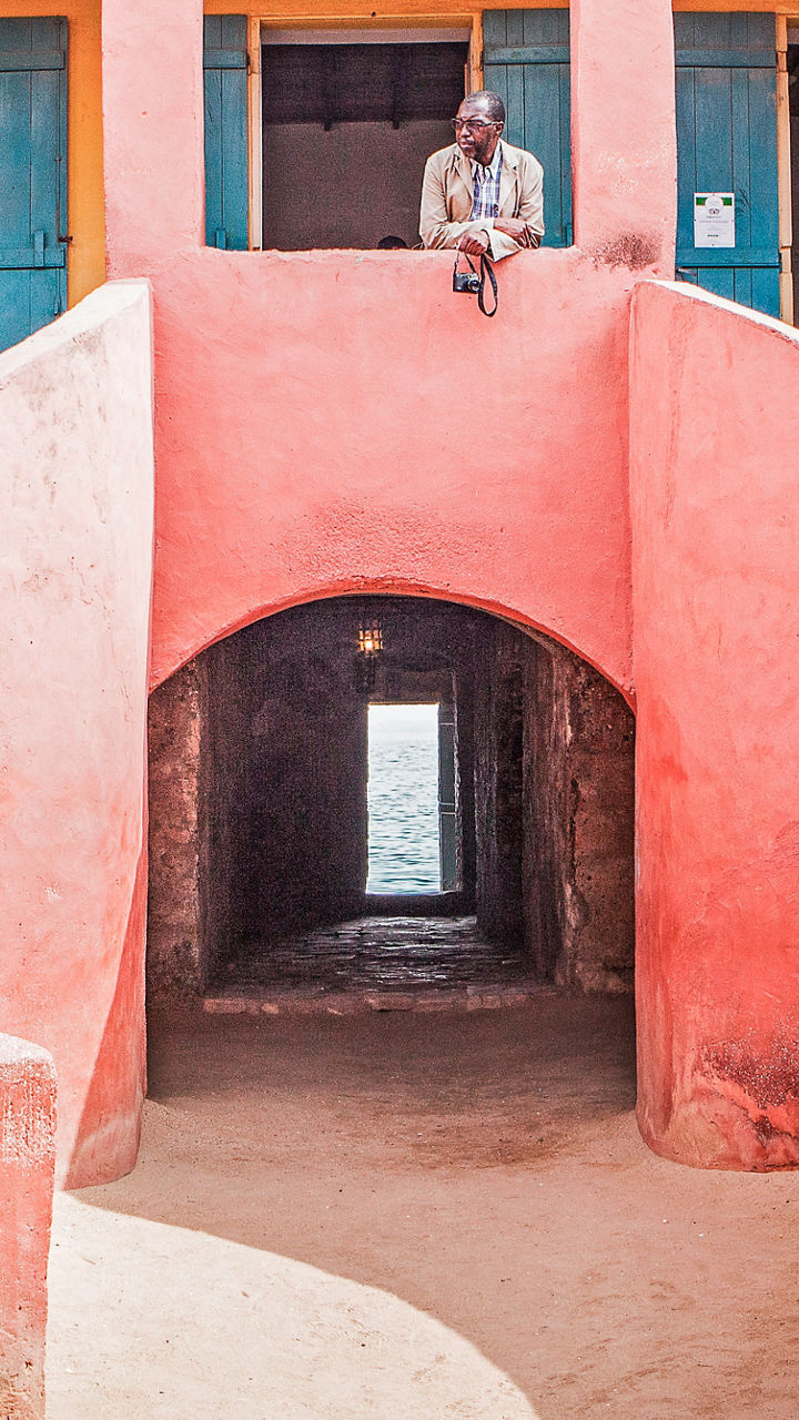 Historic pink building with curved staircases