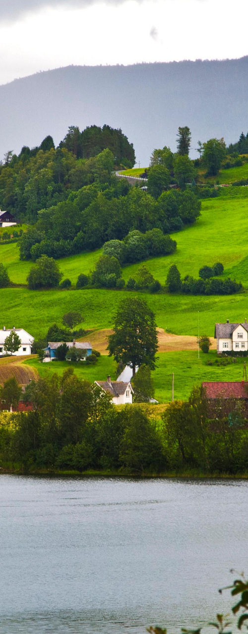 Scenic Riverside Village with Rolling Hills