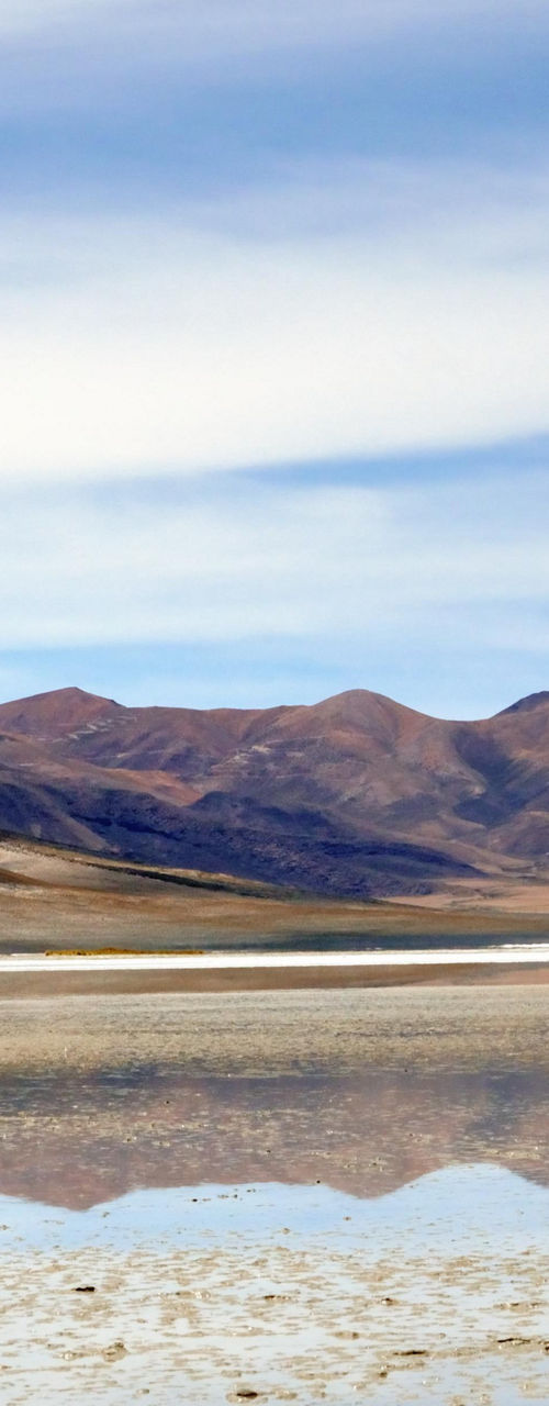 Serene mountain landscape with reflective lake