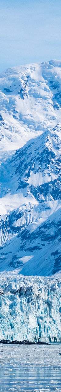 Snowy mountain range with icy glacier