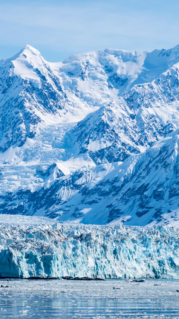 Snowy mountain range with icy glacier