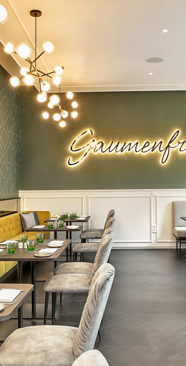 Modern restaurant interior with neon sign