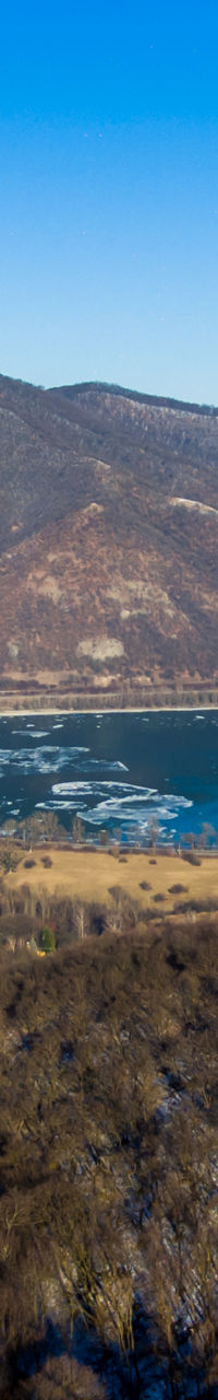 Aerial view of river bend and mountain