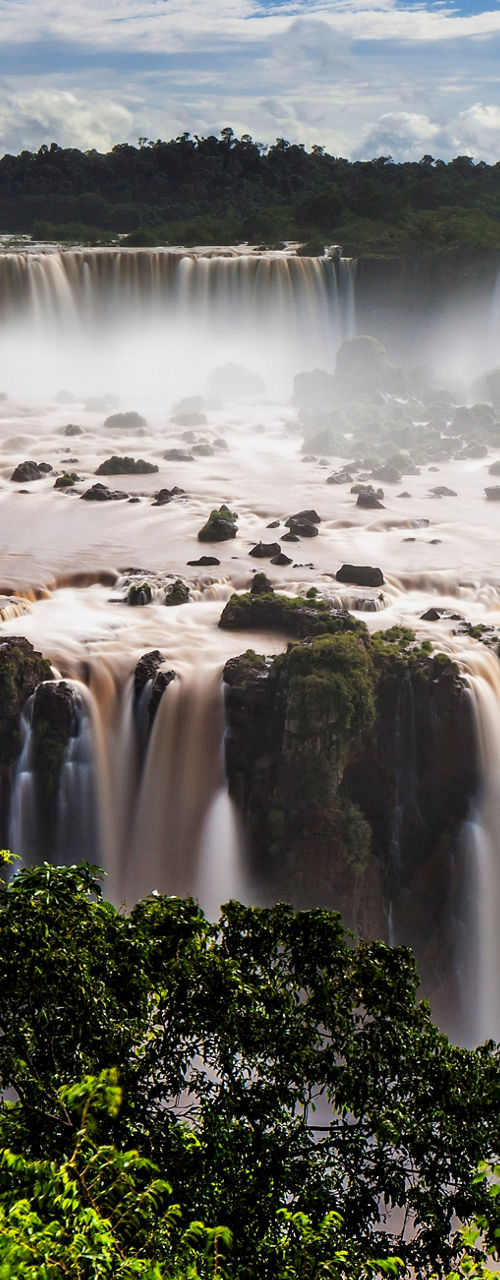 Majestic Iguazu Falls under blue sky