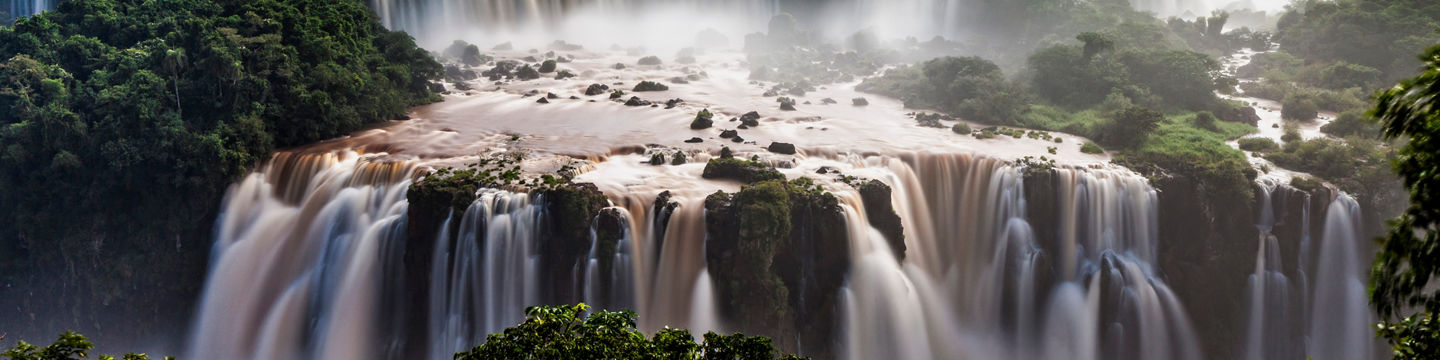 Majestic Iguazu Falls under blue sky