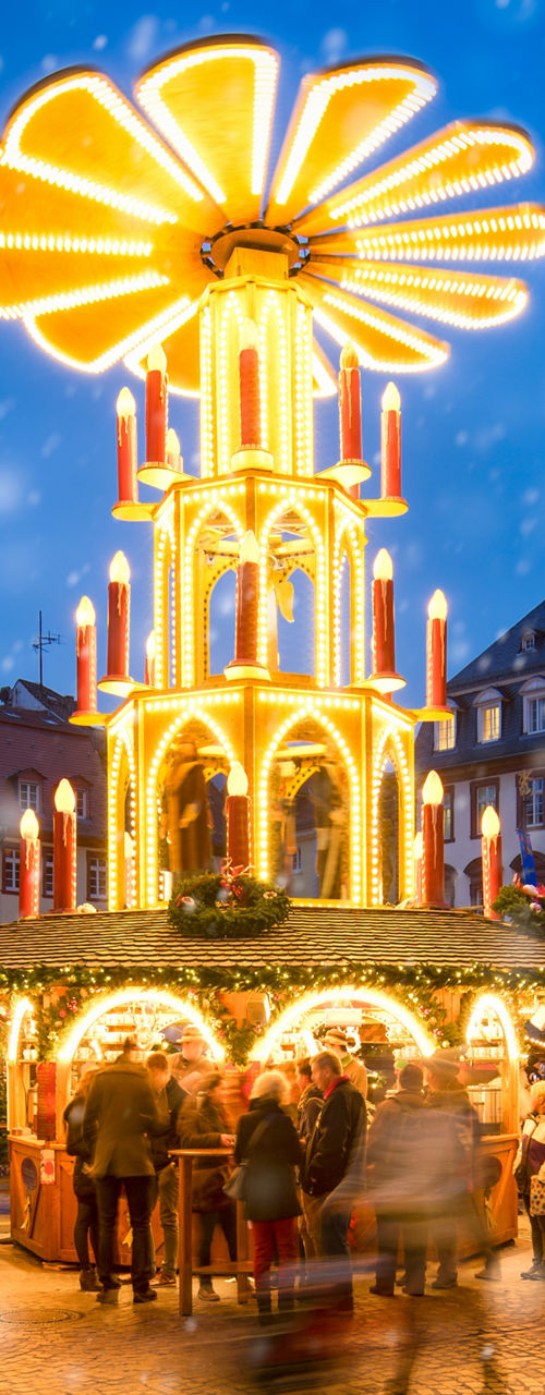Festive Christmas market with glowing carousel