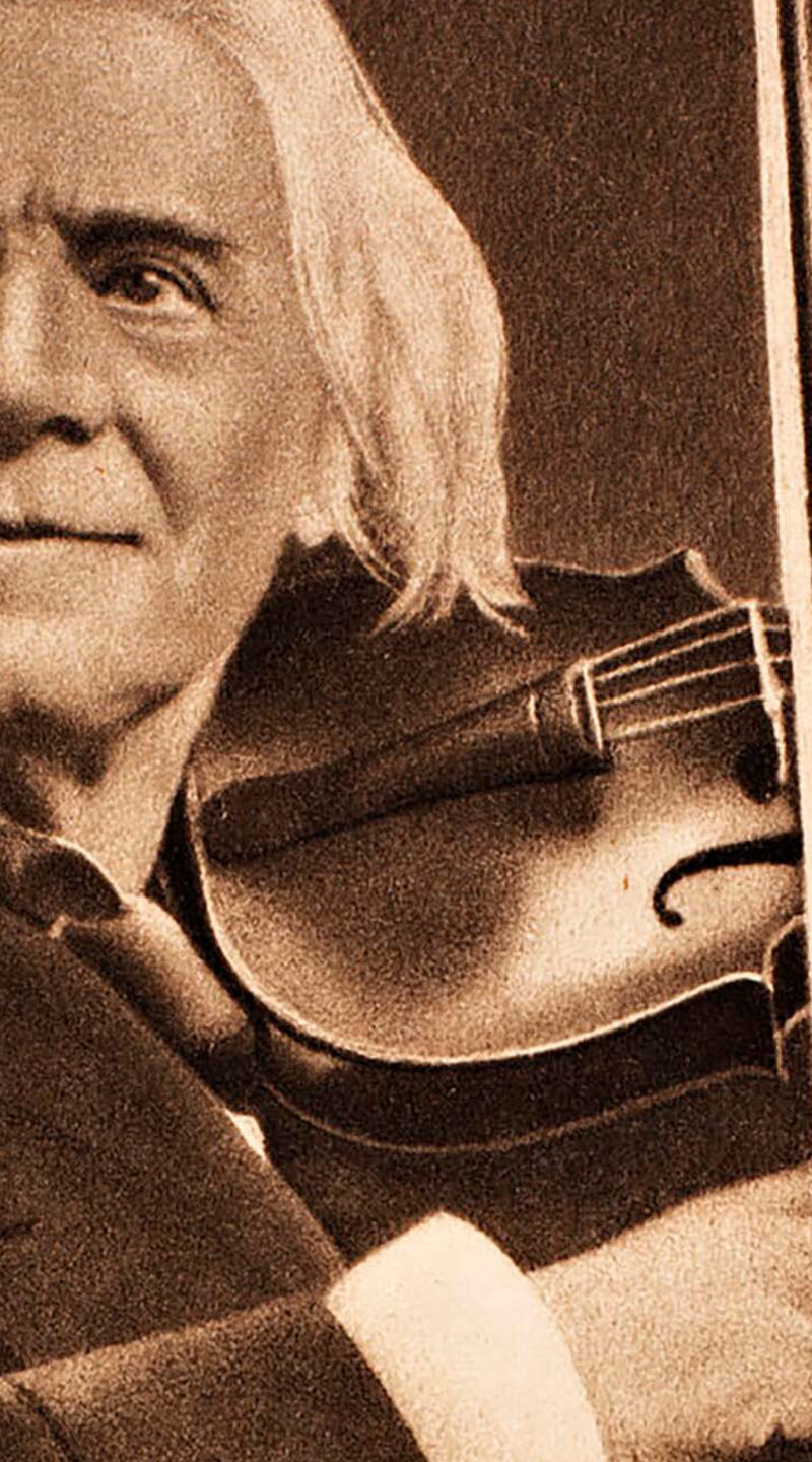 Vintage violinist in formal attire
