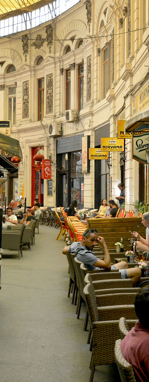 Outdoor café in historic arcade setting
