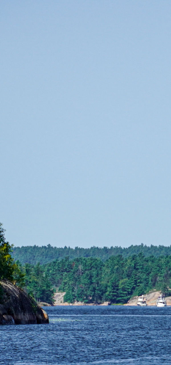Scenic lake surrounded by rocky forest