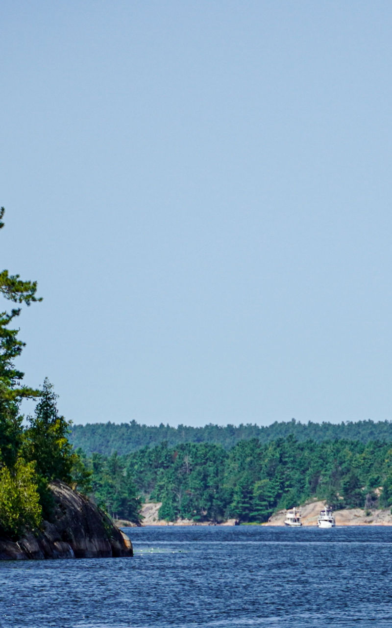 Scenic lake surrounded by rocky forest