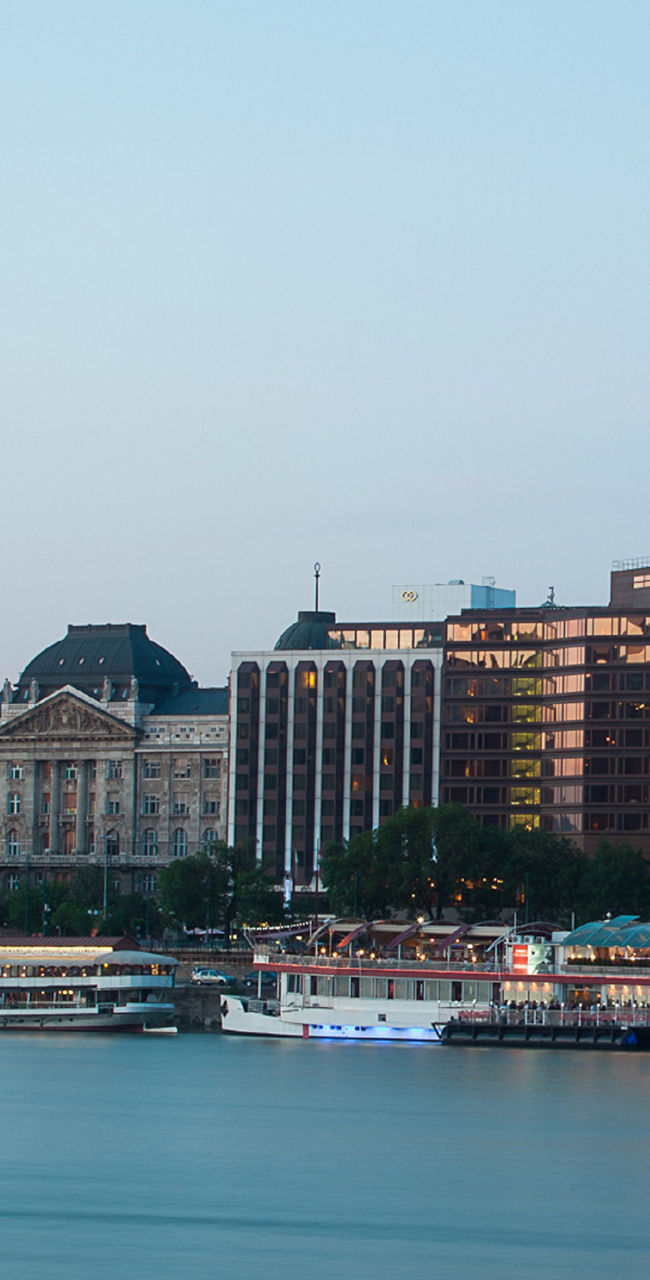 Riverside cityscape with waterfront buildings