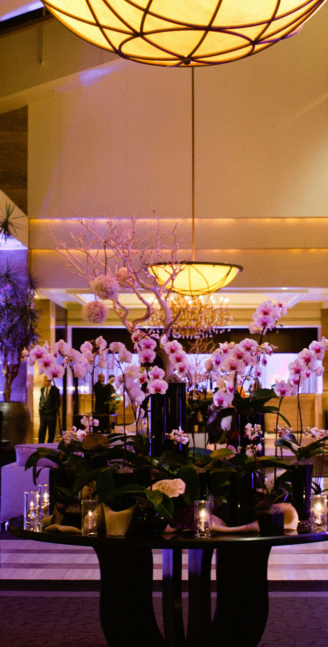 Elegant hotel lobby with floral centerpiece