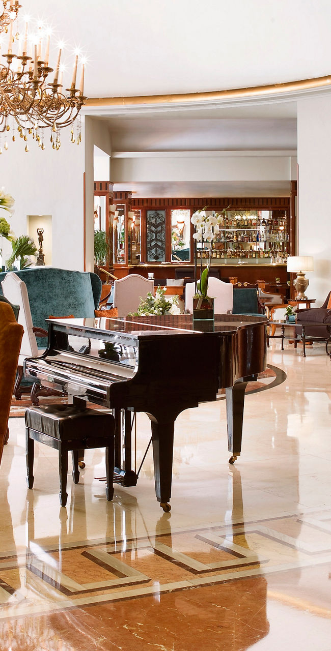 Elegant hotel lobby with grand piano
