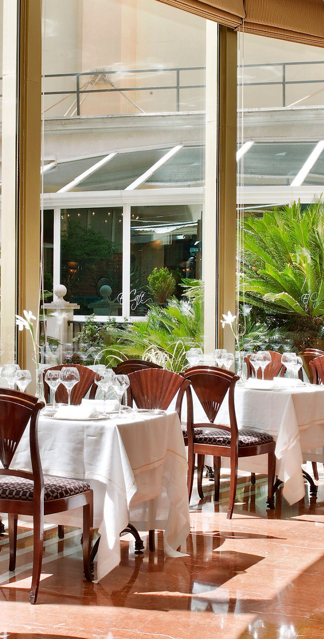 Elegant restaurant with garden view seating