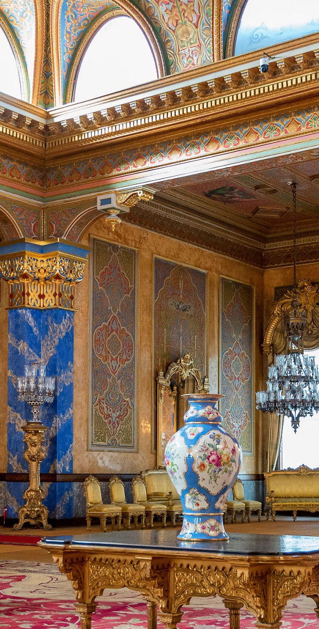 Lavish palace interior with ornate chandeliers