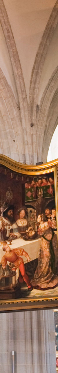 Historic cathedral interior with religious artwork