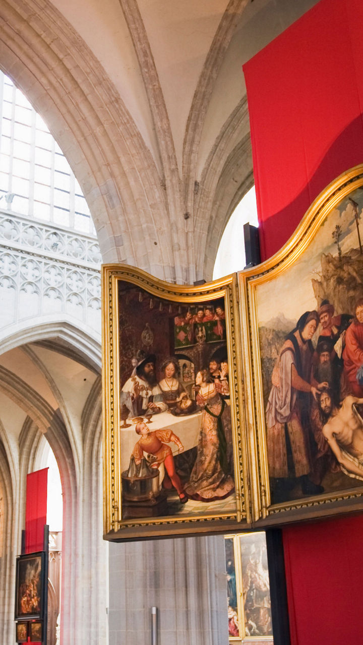 Historic cathedral interior with religious artwork