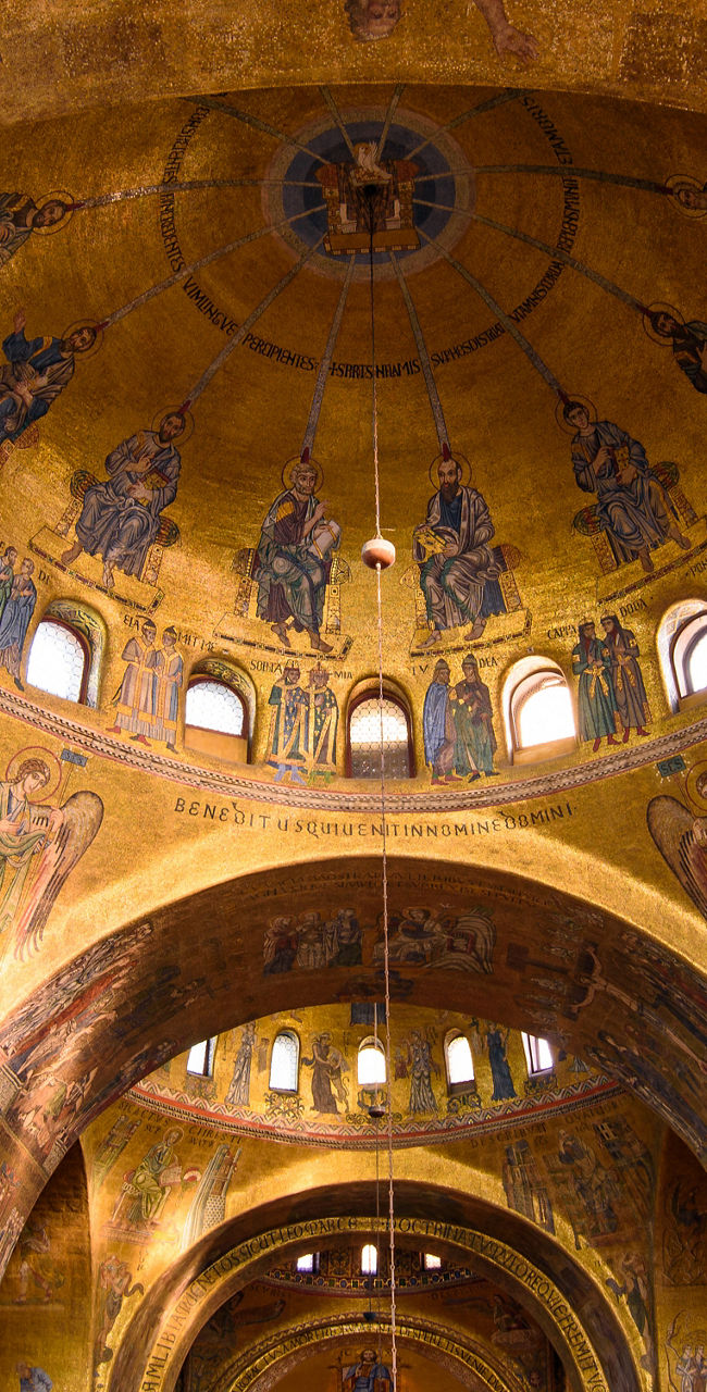 Golden Byzantine church interior with mosaics