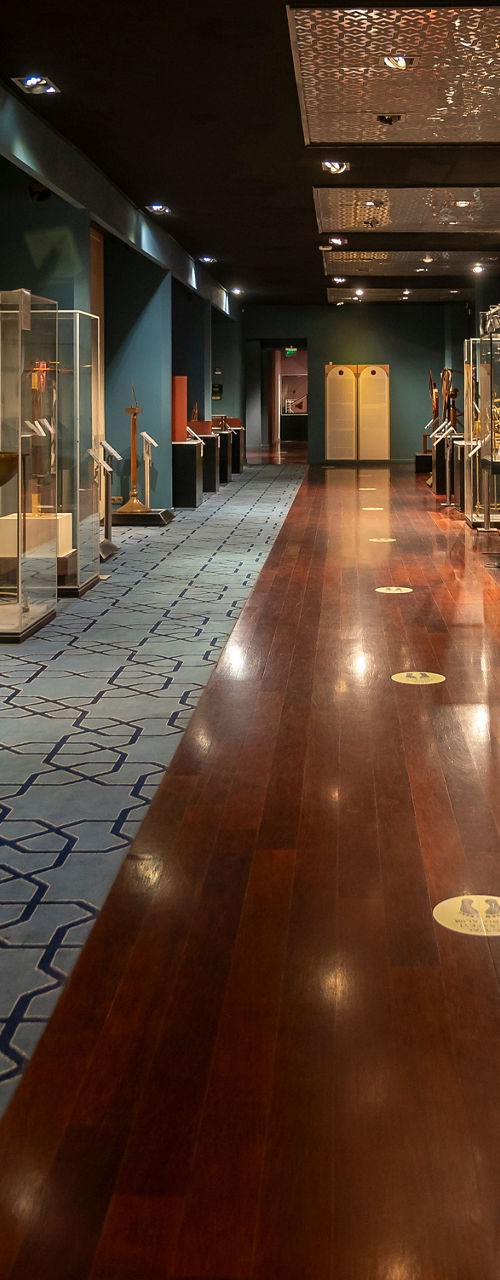 Museum exhibit hallway with glass displays