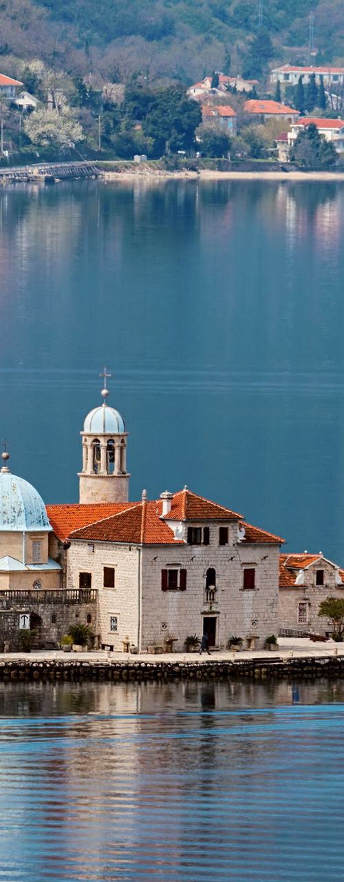 Scenic island with historic church and boat