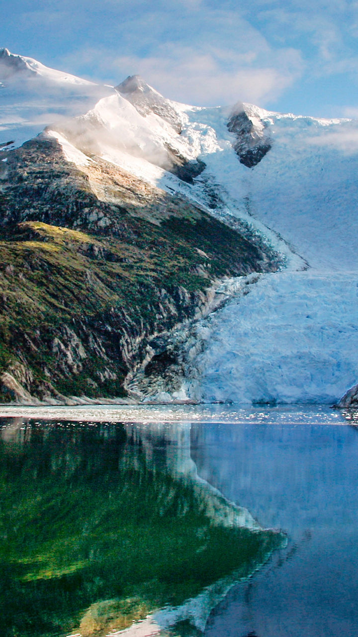 Scenic glacier with mountain reflection