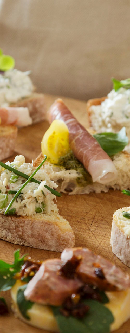 Handcrafted appetizers served on wooden tray