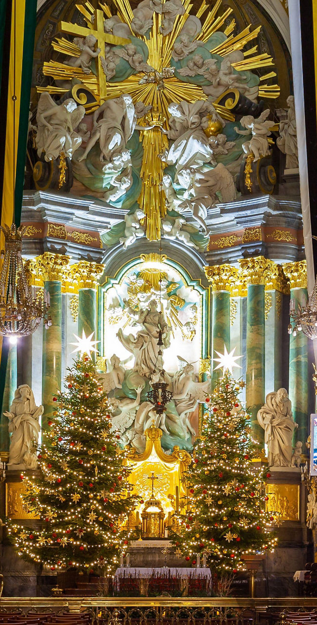 Ornate church interior with Christmas decor