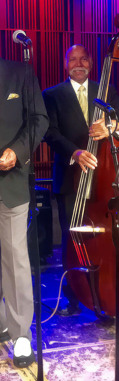 Jazz band performing on stage with instruments