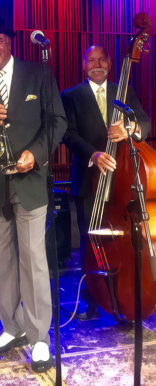 Jazz band performing on stage with instruments
