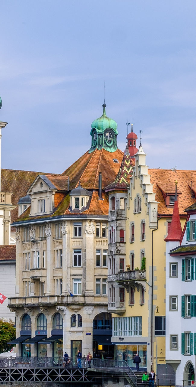 Historic European riverside town with church towers