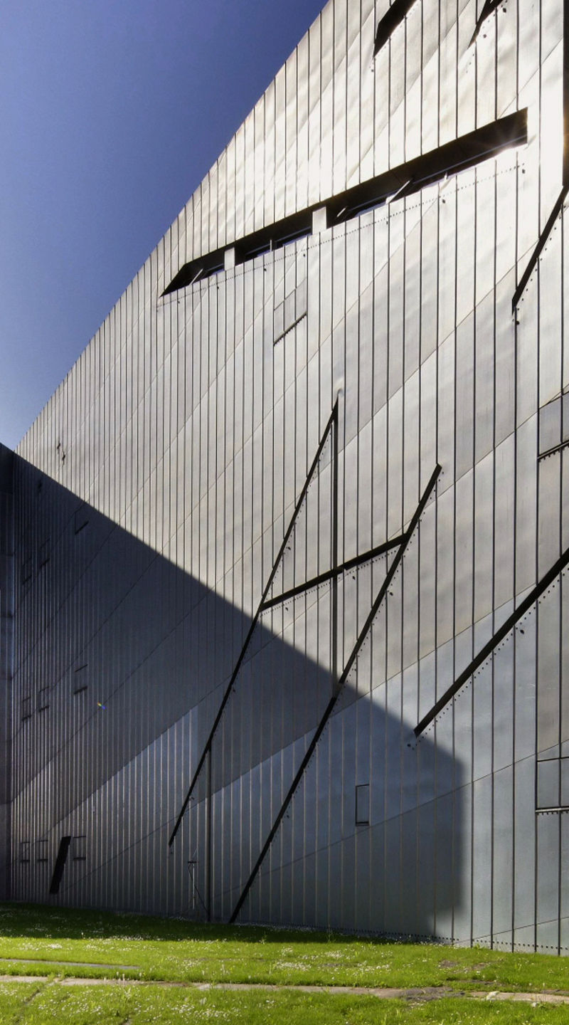 Modern angular building with metallic facade