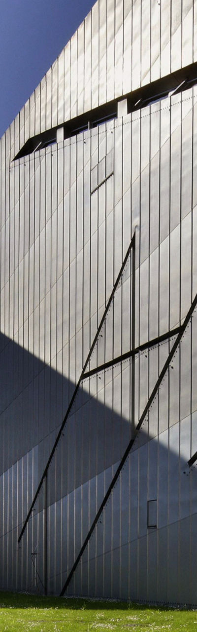 Modern angular building with metallic facade