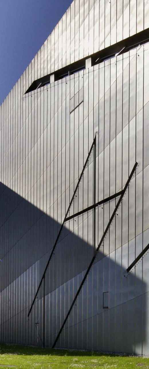 Modern angular building with metallic facade