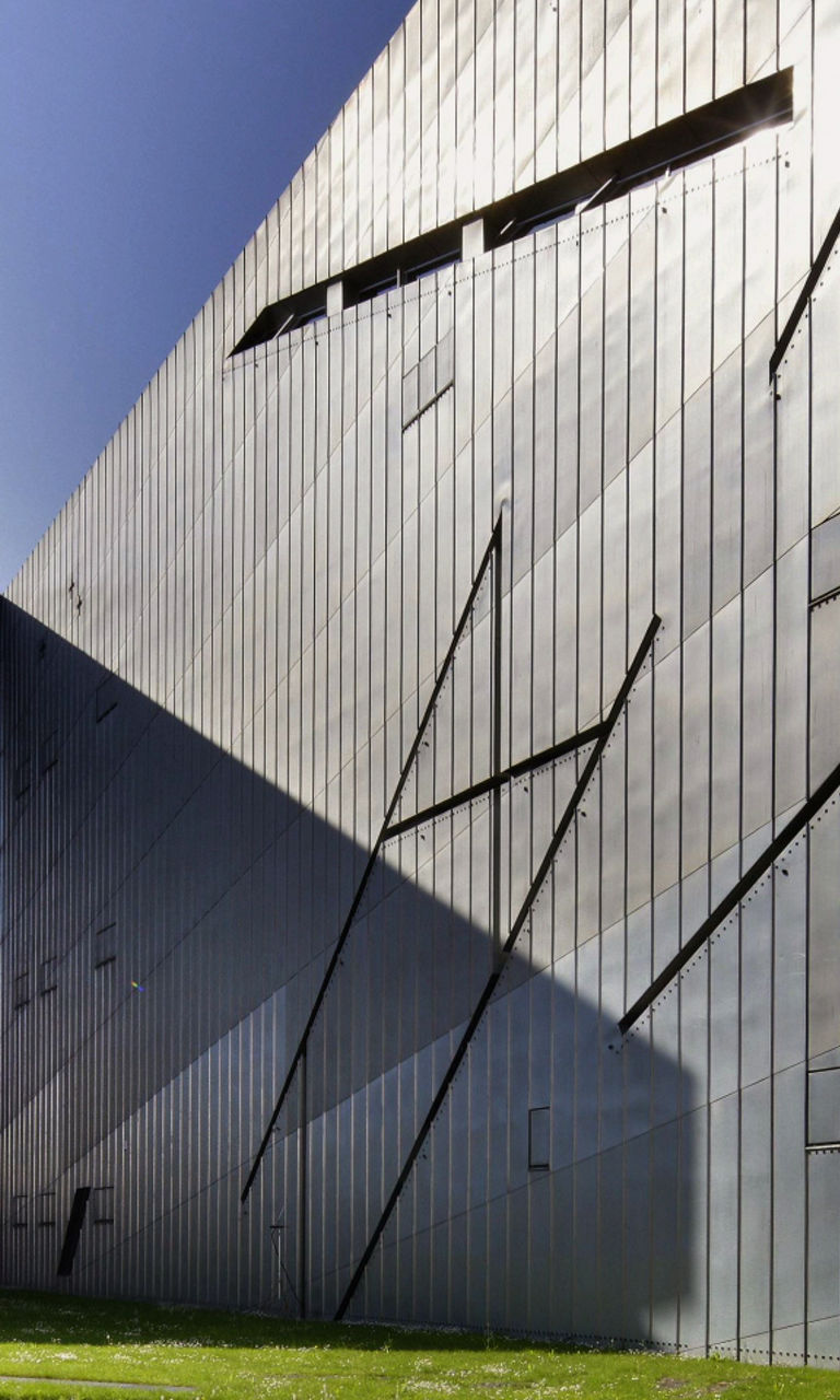 Modern angular building with metallic facade
