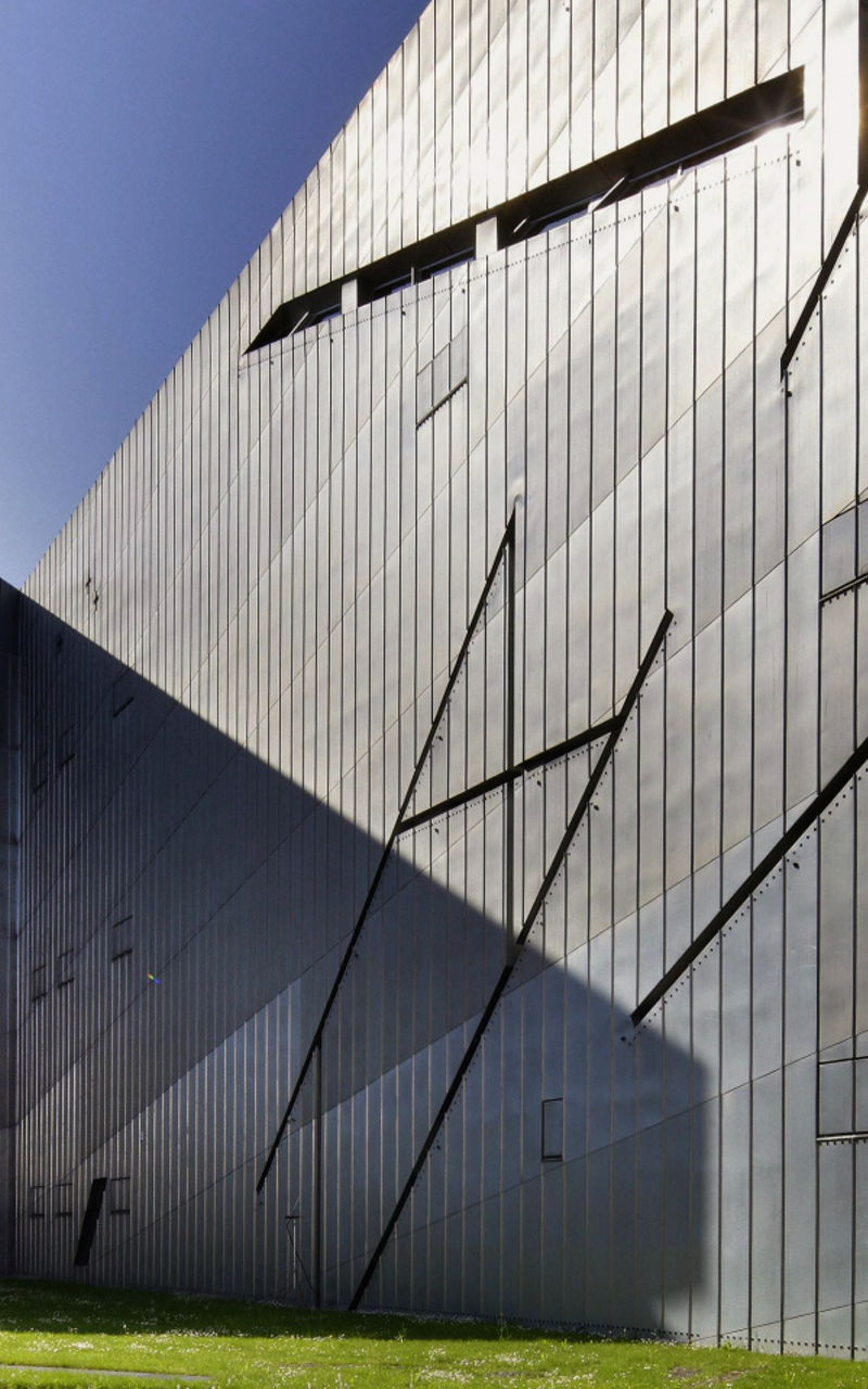 Modern angular building with metallic facade