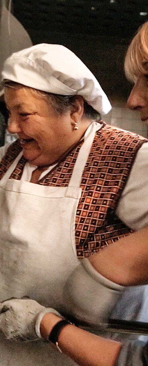 Traditional bread baking in rustic oven