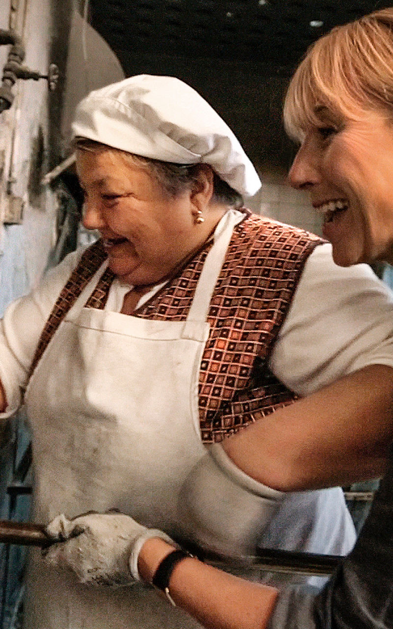 Traditional bread baking in rustic oven