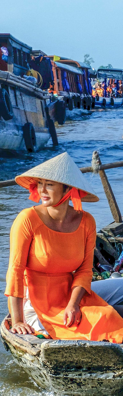 Traditional boat ride in floating market