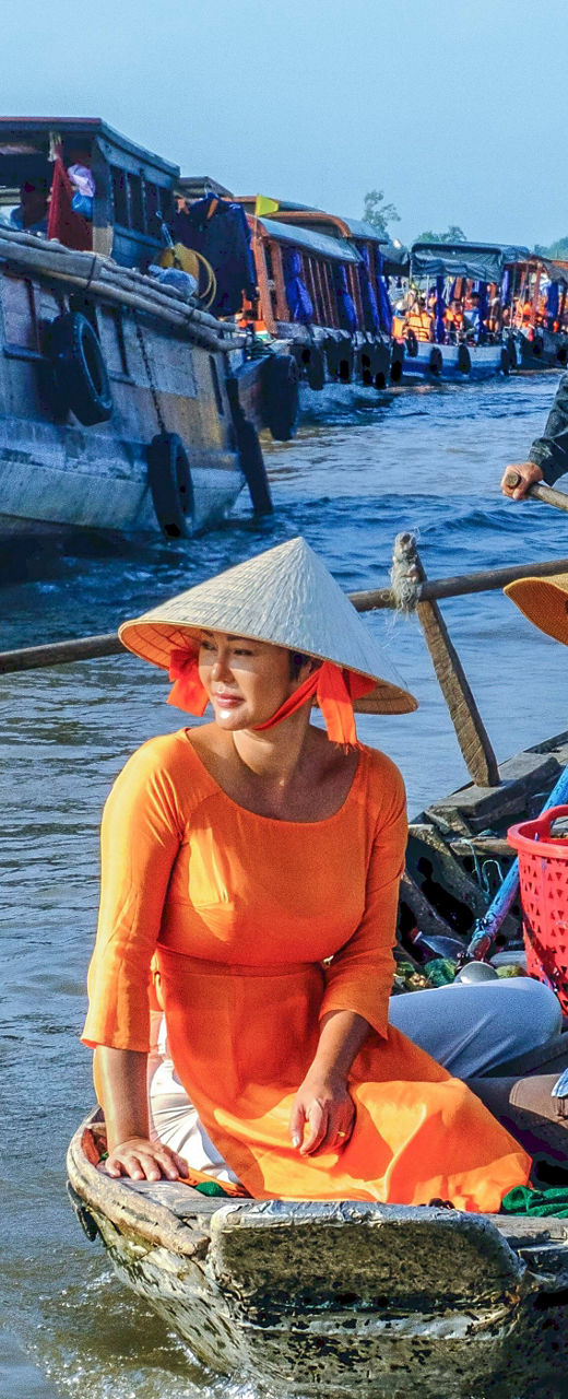 Traditional boat ride in floating market