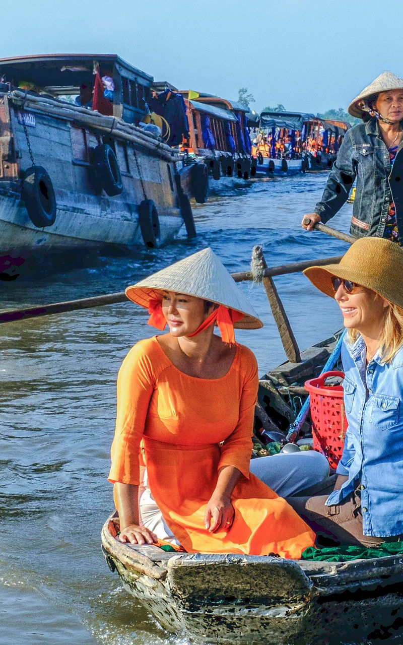 Traditional boat ride in floating market
