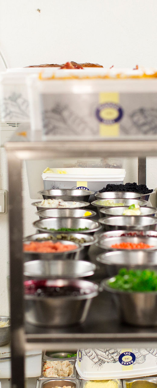 Professional kitchen with chefs preparing meals